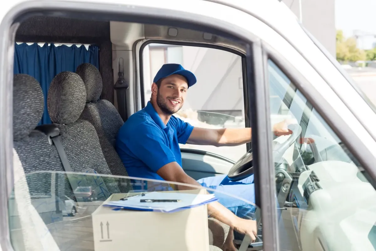 Professional drainage engineer from Liverpool One Drainage in a service van.