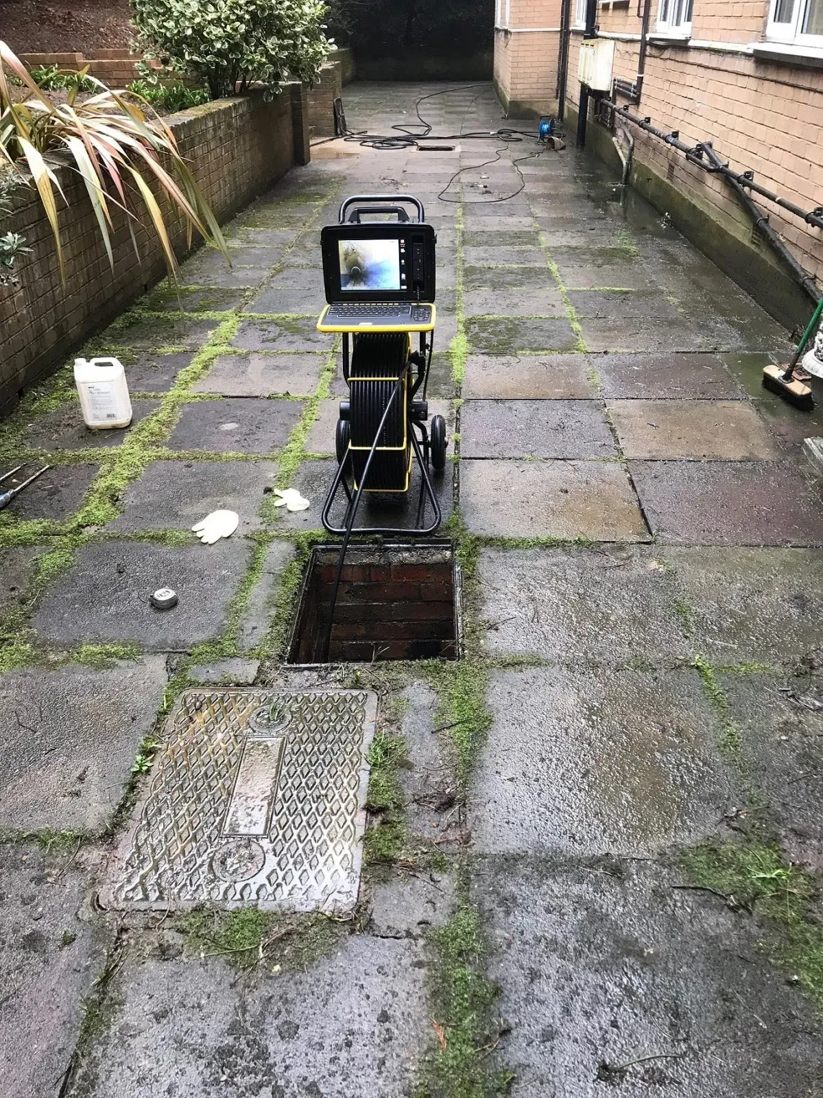 CCTV drain survey in progress on a residential driveway near Maghull