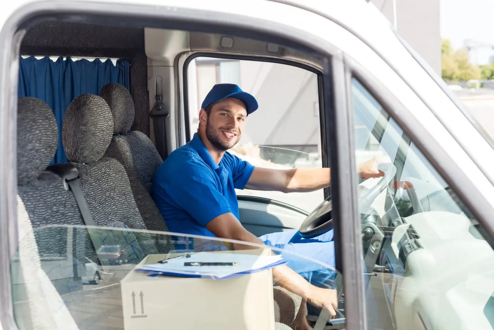 Professional drainage engineer from Liverpool One Drainage in a service van.